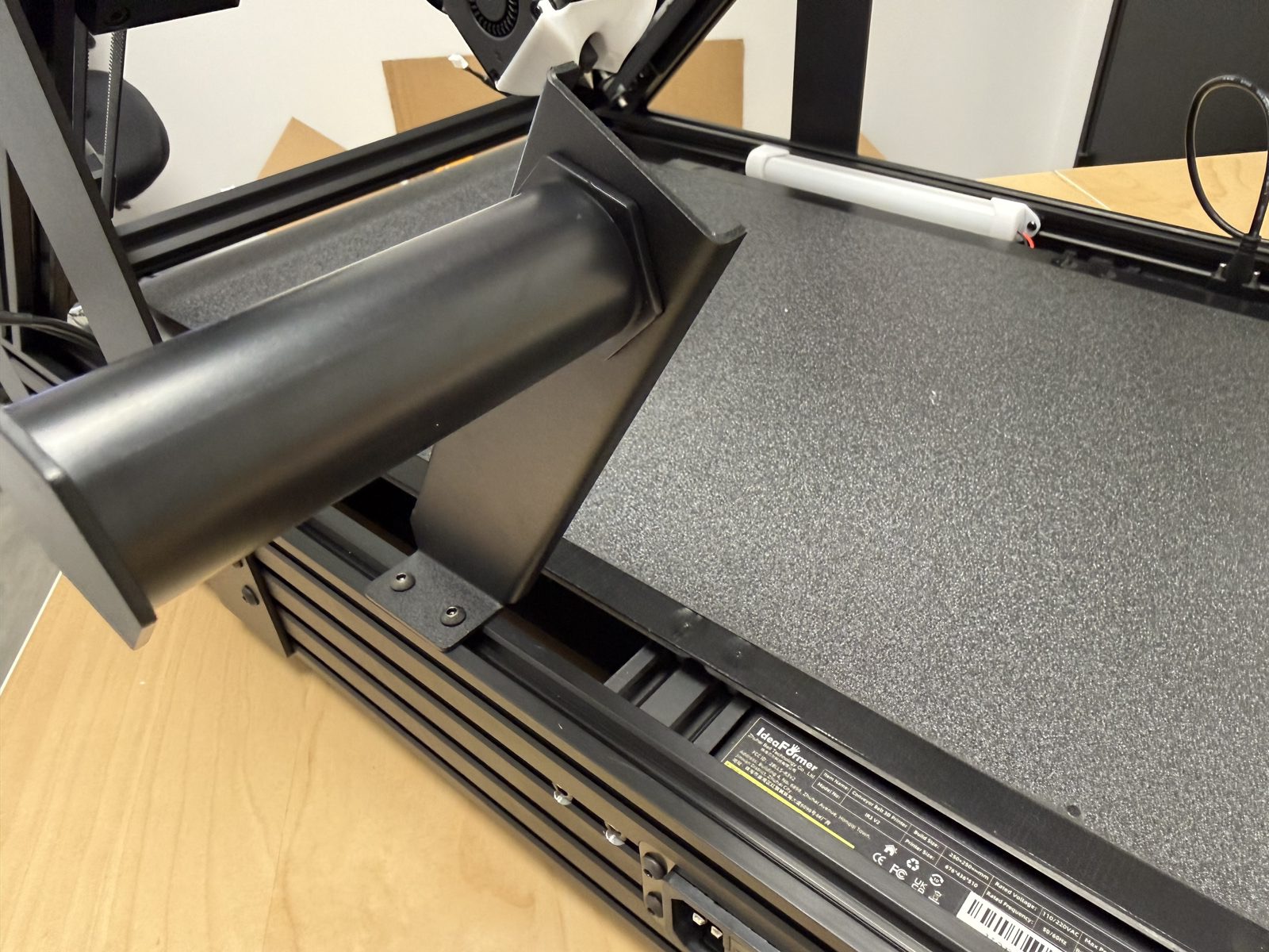 Side-view photo of the installed filament holder