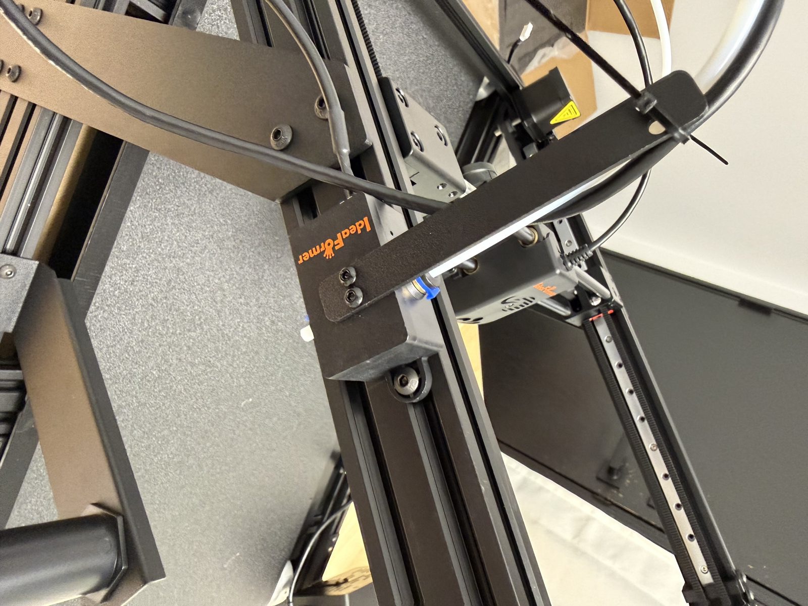 Close-up photo of the motion sensor installed with the PTFE tube seated